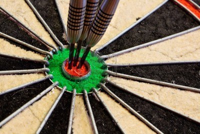 15486680-three-darts-in-the-bullseye-scoring-one-hundred-and-fifty-in-darts-tournament1